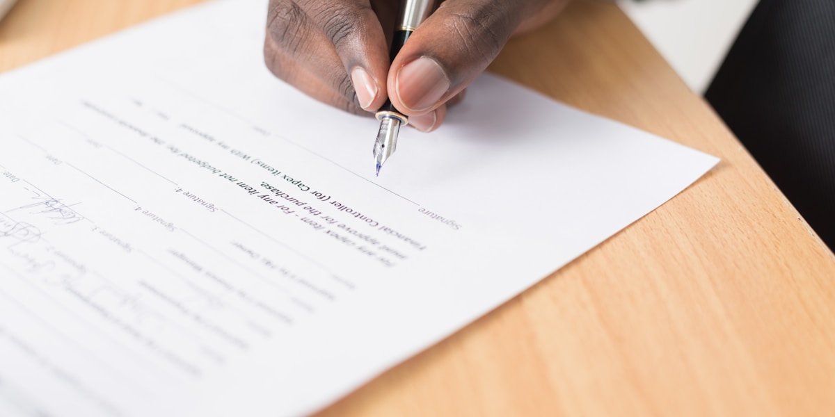 Professional attorney reviewing tax documents with client